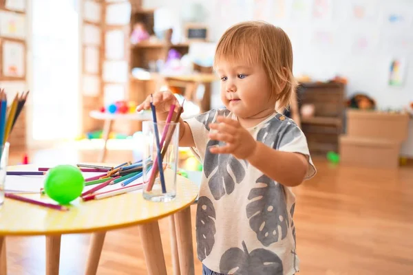 Adorable Toddler Holding Pencils Lots Toys Kindergarten — Stock Photo, Image