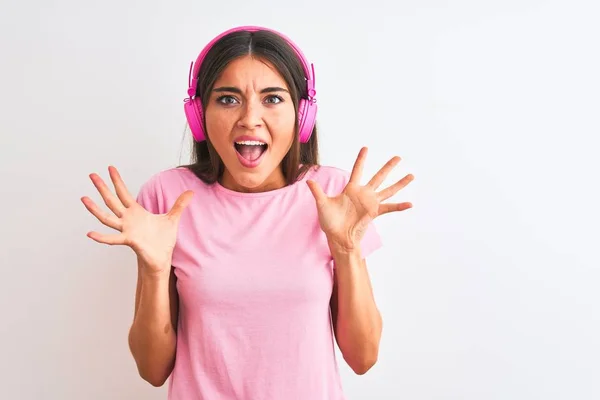 Young Beautiful Woman Listening Music Using Headphones Isolated White Background — 스톡 사진