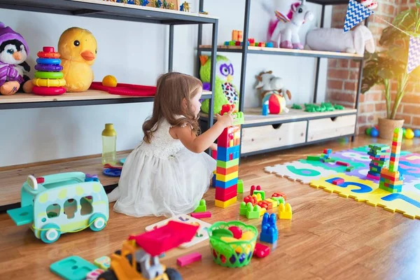 Adorable Blonde Toddler Playing Building Blocks Toy Lots Toys Kindergarten — Stock Photo, Image