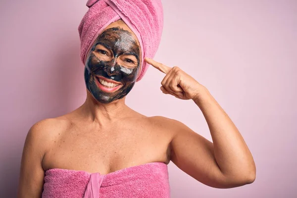 Middle Age Brunette Woman Wearing Beauty Black Face Mask Isolated — Stock Photo, Image