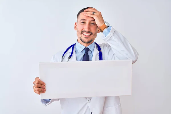Young Doctor Man Holding Blank Advertising Banner Isolated Background Stressed — 스톡 사진