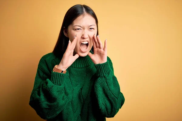 Young Beautiful Asian Woman Wearing Green Winter Sweater Yellow Isolated — 스톡 사진