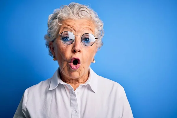 Senior Beautiful Woman Wearing Elegant Shirt Glasses Isolated Blue Background Stock Photo