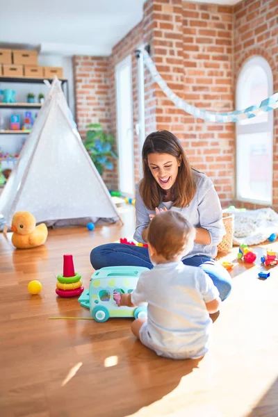 Beautiful Teacher Toddler Playing Lots Toys Kindergarten — Stock Photo, Image