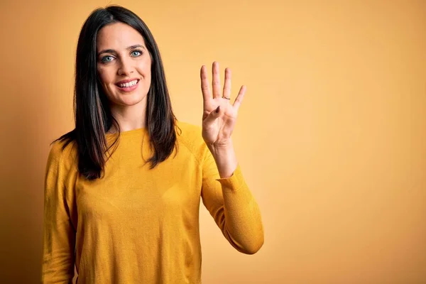 Young Brunette Woman Blue Eyes Wearing Casual Sweater Yellow Background — Stockfoto