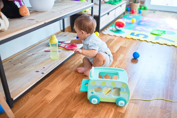 Adorable Toddler Sitting Floor Playing Toys Kindergarten — ストック写真