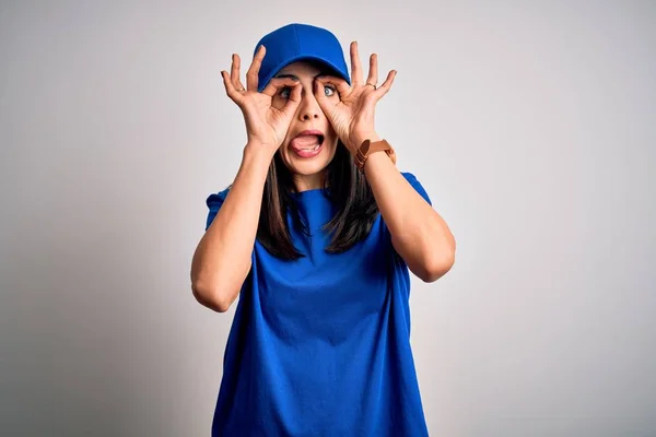 Young Delivery Woman Blue Eyes Wearing Cap Standing Blue Background — 스톡 사진