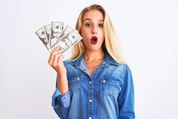 Young Beautiful Blond Woman Holding Dollars Standing Isolated White Background — 스톡 사진