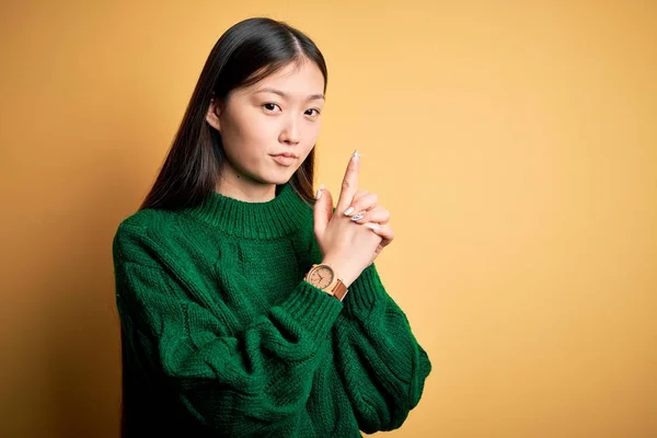 Young Beautiful Asian Woman Wearing Green Winter Sweater Yellow Isolated — Stock Photo, Image