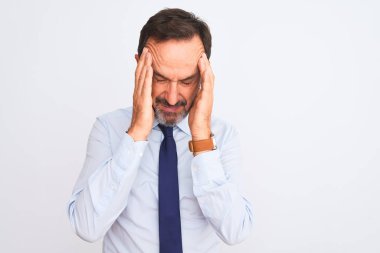 Middle age businessman wearing elegant tie standing over isolated white background with hand on head for pain in head because stress. Suffering migraine.