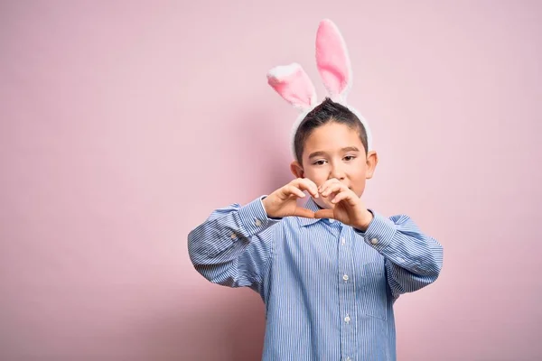 Niño Pequeño Con Orejas Conejito Pascua Sobre Fondo Rosa Aislado — Foto de Stock
