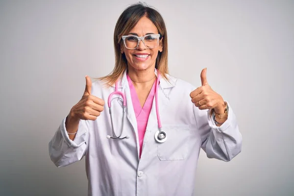 Middle Age Beautiful Doctor Woman Wearing Pink Stethoscope Isolated White — 스톡 사진