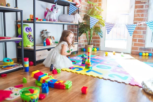 Adorable Blonde Toddler Playing Building Blocks Toy Lots Toys Kindergarten — Stock Photo, Image