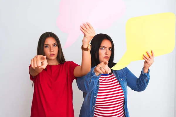 Young Beautiful Women Holding Speech Bubble Standing Isolated White Background — Stok fotoğraf
