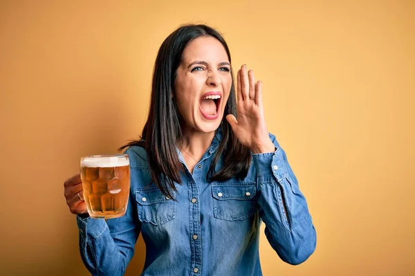 Young Woman Blue Eyes Drinking Jar Beer Standing Isolated Yellow — 스톡 사진