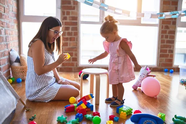 Young Beautiful Teacher Toddler Playing Building Blocks Toy Table Kindergarten — Stock Photo, Image