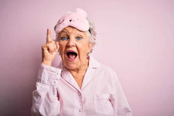 Senior Beautiful Woman Wearing Sleep Mask Pajama Isolated Pink Background — Stock Photo, Image