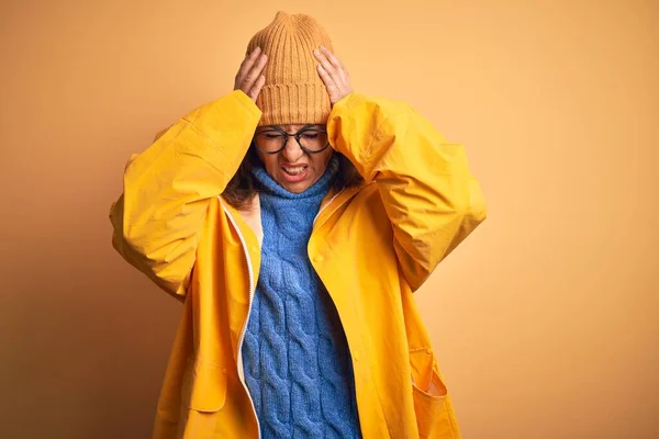 Middle Age Woman Wearing Yellow Raincoat Winter Hat Isolated Background — ストック写真