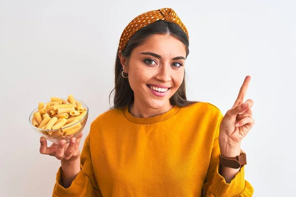 Young Beautiful Woman Holding Bowl Macaroni Pasta Isolated White Background — Stock Photo, Image