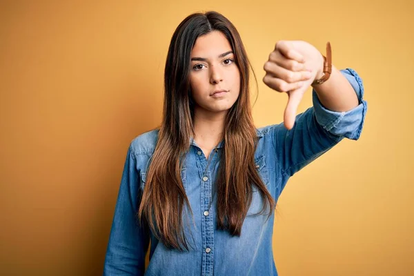 Young Beautiful Girl Wearing Casual Denim Shirt Standing Isolated Yellow — Stock Photo, Image