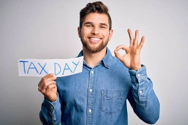 Young Blond Man Beard Blue Eyes Holding Paper Tax Day — 스톡 사진