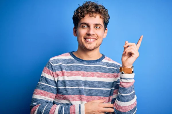 Young Blond Handsome Man Curly Hair Wearing Striped Sweater Blue — Stock Photo, Image