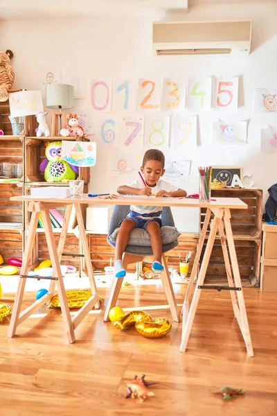 Beautiful African American Toddler Sitting Drawing Using Paper Pencils Desk — Stock Photo, Image