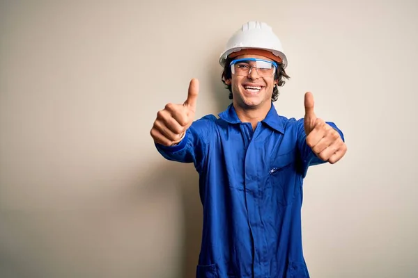 Young Constructor Man Wearing Uniform Security Helmet Isolated White Background — Stok fotoğraf