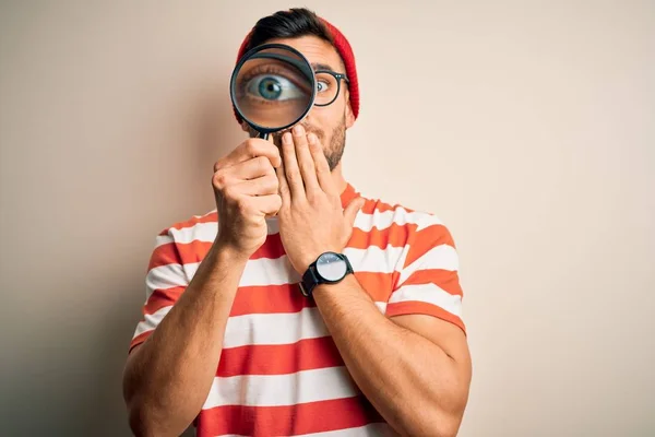 Young Detective Man Looking Magnifying Glass Isolated Background Cover Mouth — ストック写真