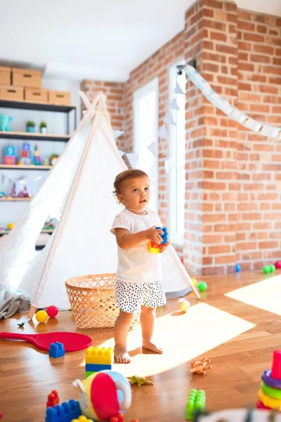 Adorable Toddler Playing Building Blocks Lots Toys Kindergarten — Stock Photo, Image