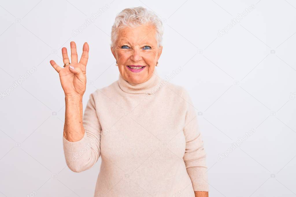 Senior grey-haired woman wearing turtleneck sweater standing over isolated white background showing and pointing up with fingers number four while smiling confident and happy.