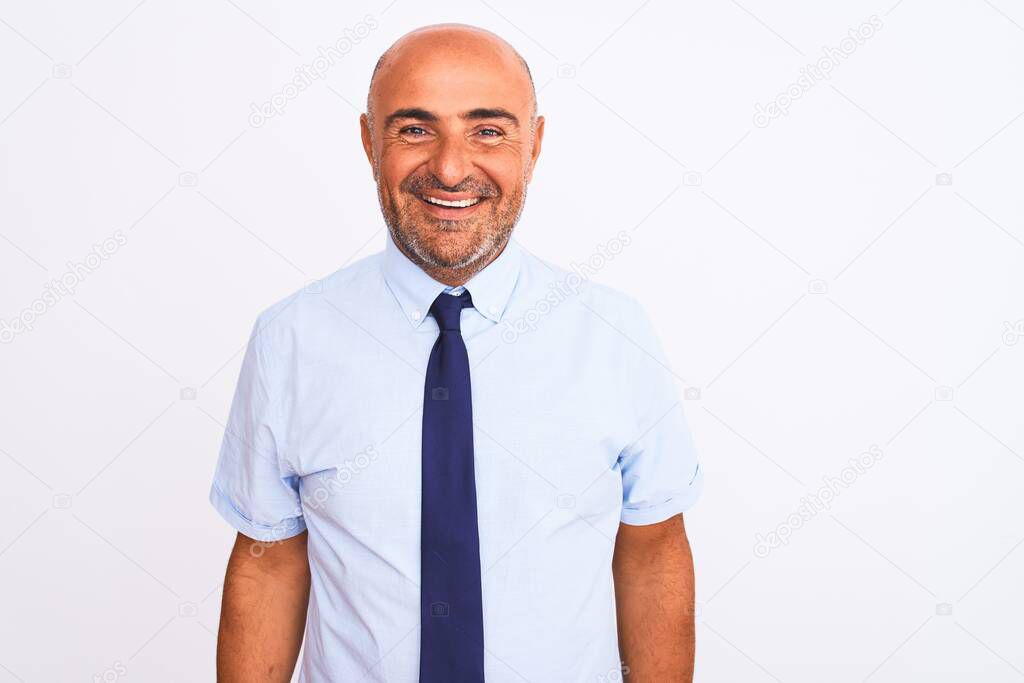Middle age businessman wearing tie standing over isolated white background with a happy and cool smile on face. Lucky person.