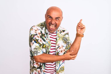 Middle age handsome man on holiday wearing summer shirt over isolated white background with a big smile on face, pointing with hand and finger to the side looking at the camera.
