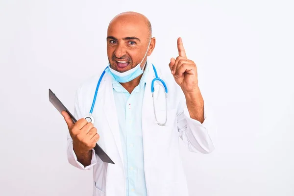 Doctor Man Wearing Stethoscope Mask Holding Clipboard Isolated White Background — Stock Photo, Image