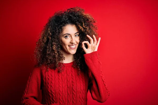 Young Beautiful Woman Curly Hair Piercing Wearing Casual Red Sweater — 스톡 사진