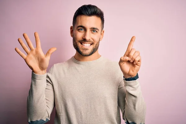 Young Handsome Man Wearing Casual Sweater Standing Isolated Pink Background — Stockfoto