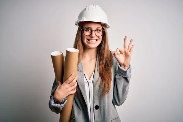Young Beautiful Redhead Architect Woman Wearing Glasses Safety Helmet Holding — 图库照片