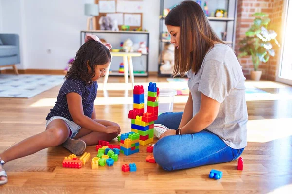 Beautiful Teacher Toddler Girl Playing Construction Blocks Bulding Tower Kindergarten — Stock Photo, Image