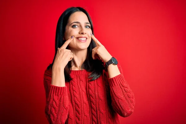 Young Brunette Woman Blue Eyes Wearing Casual Sweater Isolated Red — Stockfoto