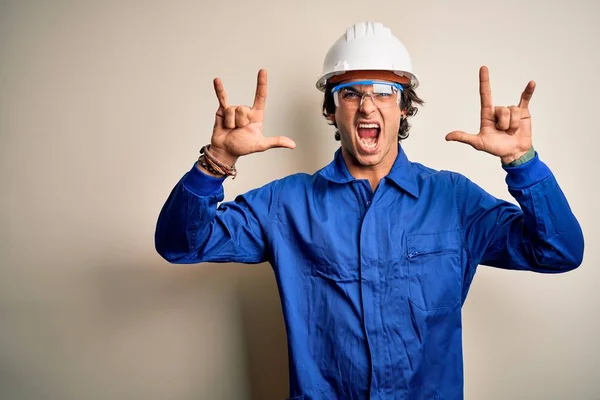 Young Constructor Man Wearing Uniform Security Helmet Isolated White Background — Stok fotoğraf