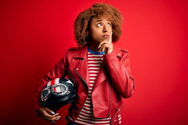 Young African American Motocyclist Woman Holding Motorcycle Helmet Red Background — Stock Photo, Image