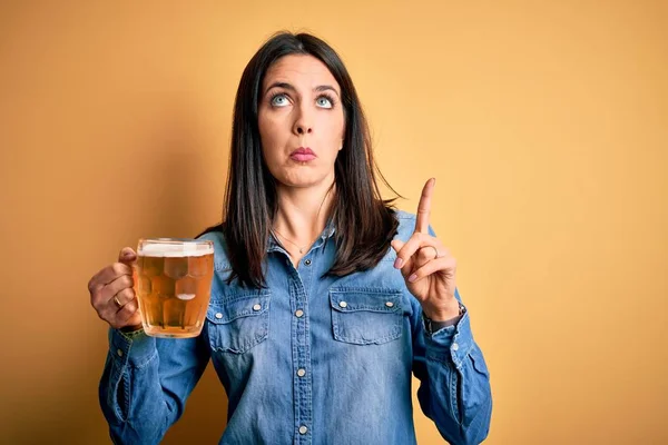 Young Woman Blue Eyes Drinking Jar Beer Standing Isolated Yellow — 스톡 사진