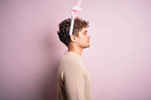Young Handsome Blond Man Wearing Easter Rabbit Ears Isolated Pink — Stockfoto