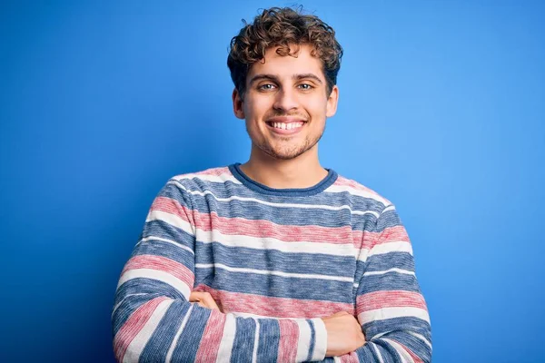 Young Blond Handsome Man Curly Hair Wearing Striped Sweater Blue — Stock Photo, Image
