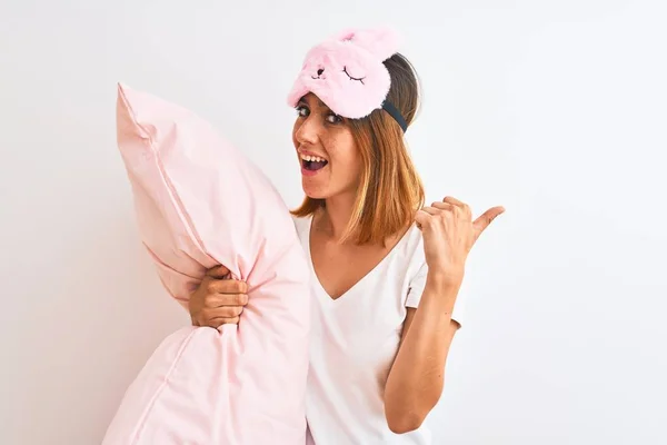 Beautiful Redhead Woman Wearing Sleeping Mask Cuddling Pink Pillow Isolated — Stock Photo, Image