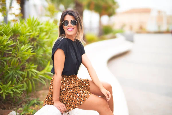 Young Beautiful Girl Wearing Sunglasses Shirt Animal Print Skirt Sitting — Stock Photo, Image