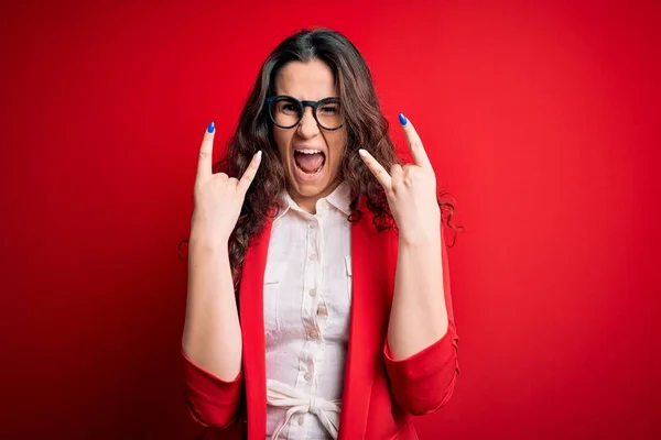 Young Beautiful Woman Curly Hair Wearing Jacket Glasses Red Background — Stock Fotó