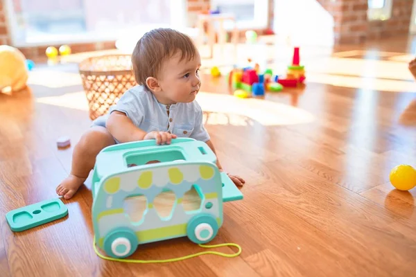 Adorable Toddler Sitting Floor Playing Toys Kindergarten — ストック写真