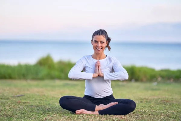 Young Beautiful Sportwoman Smiling Happy Practicing Yoga Coach Sitting Smile — Stock Photo, Image