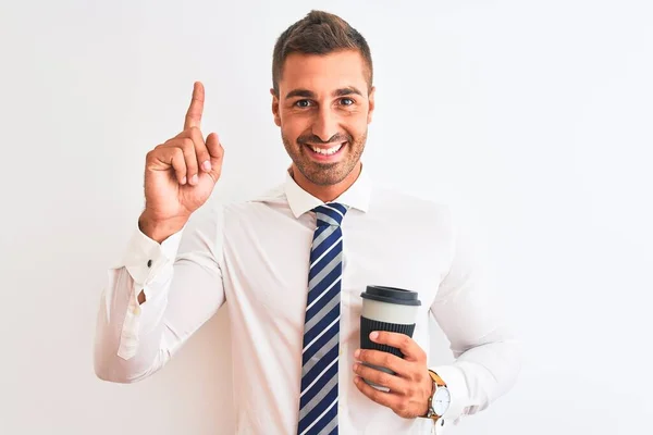 Jonge Knappe Zakenman Drinken Take Away Koffie Geïsoleerde Achtergrond Verrast — Stockfoto